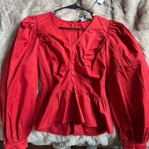 Waist cinching red blouse